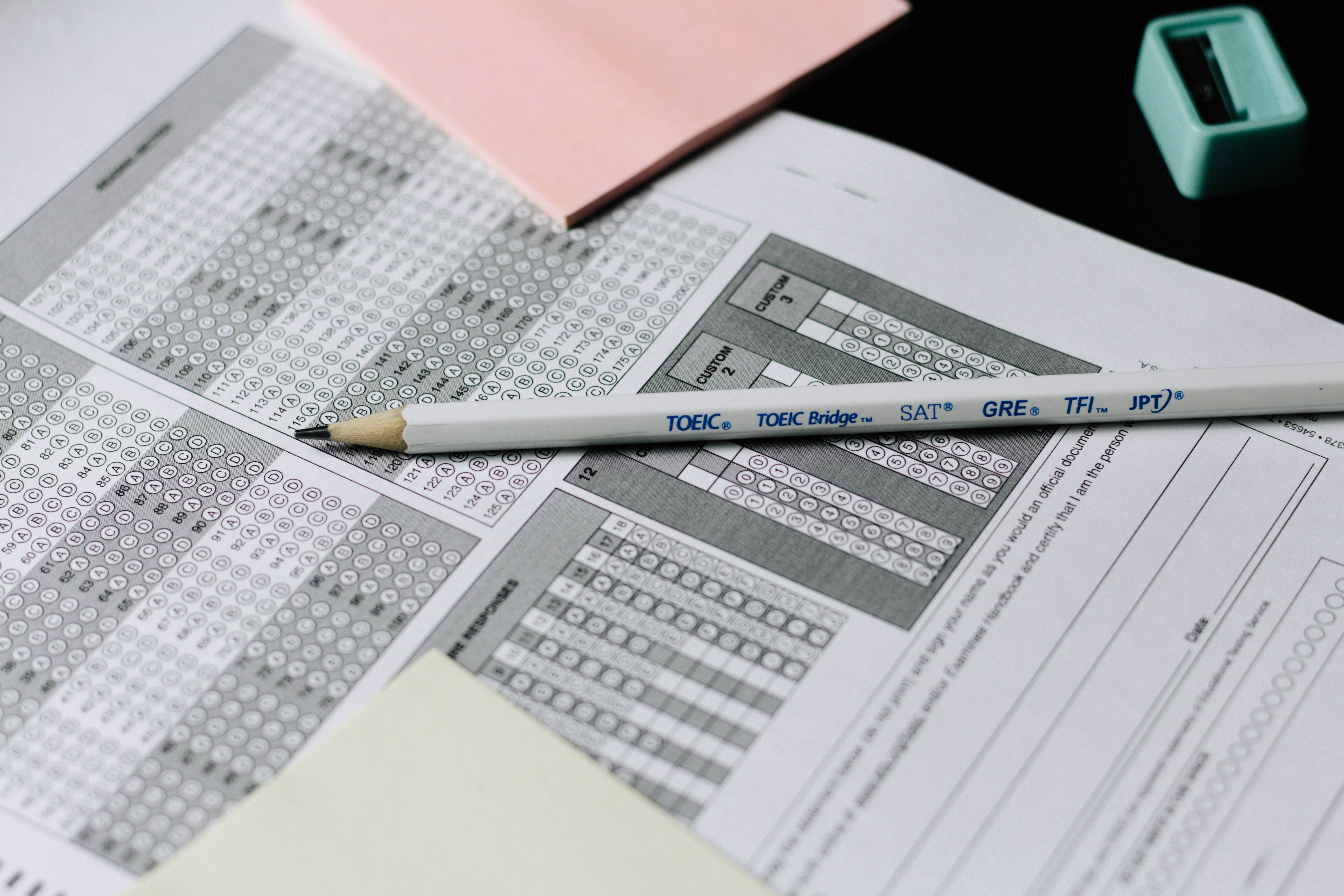 SSC CGL exam answer sheet with pencil — competitive exam preparation